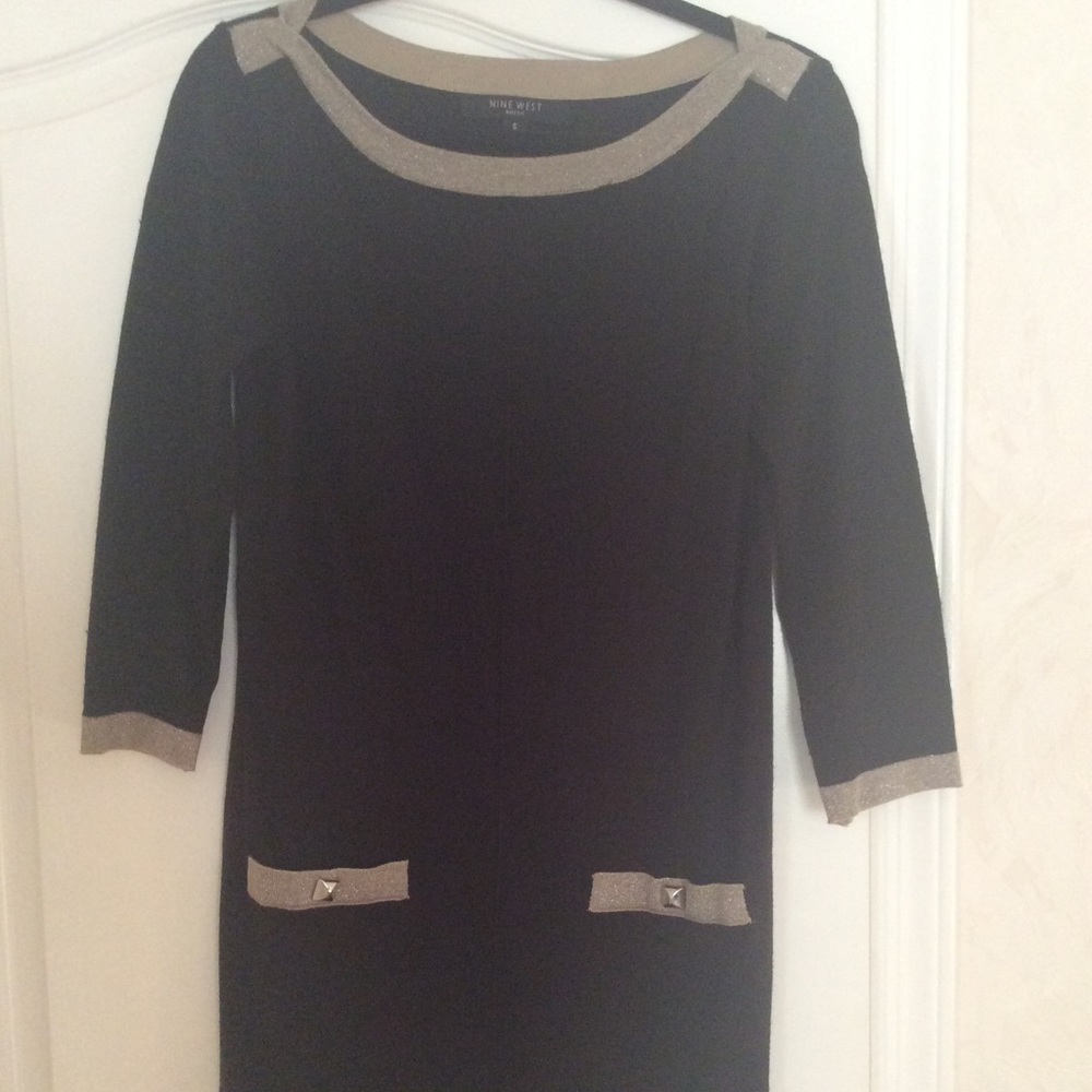 Elegant black dress with silver accents